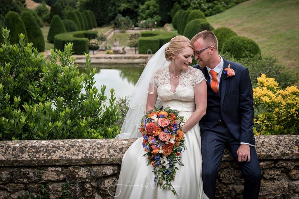 Bride & groom portrait in gardens