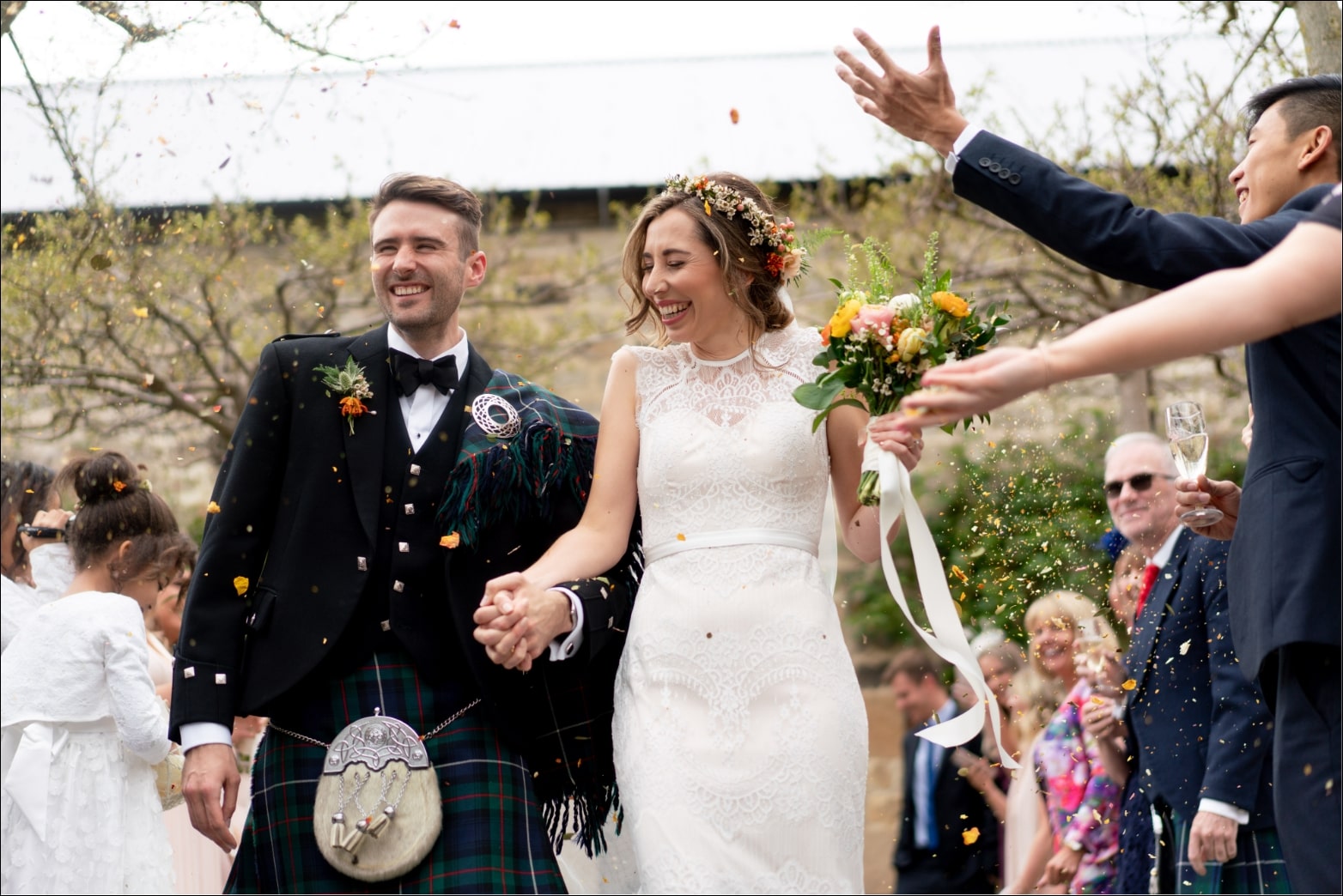 Photo of Dorset wedding couple laughing