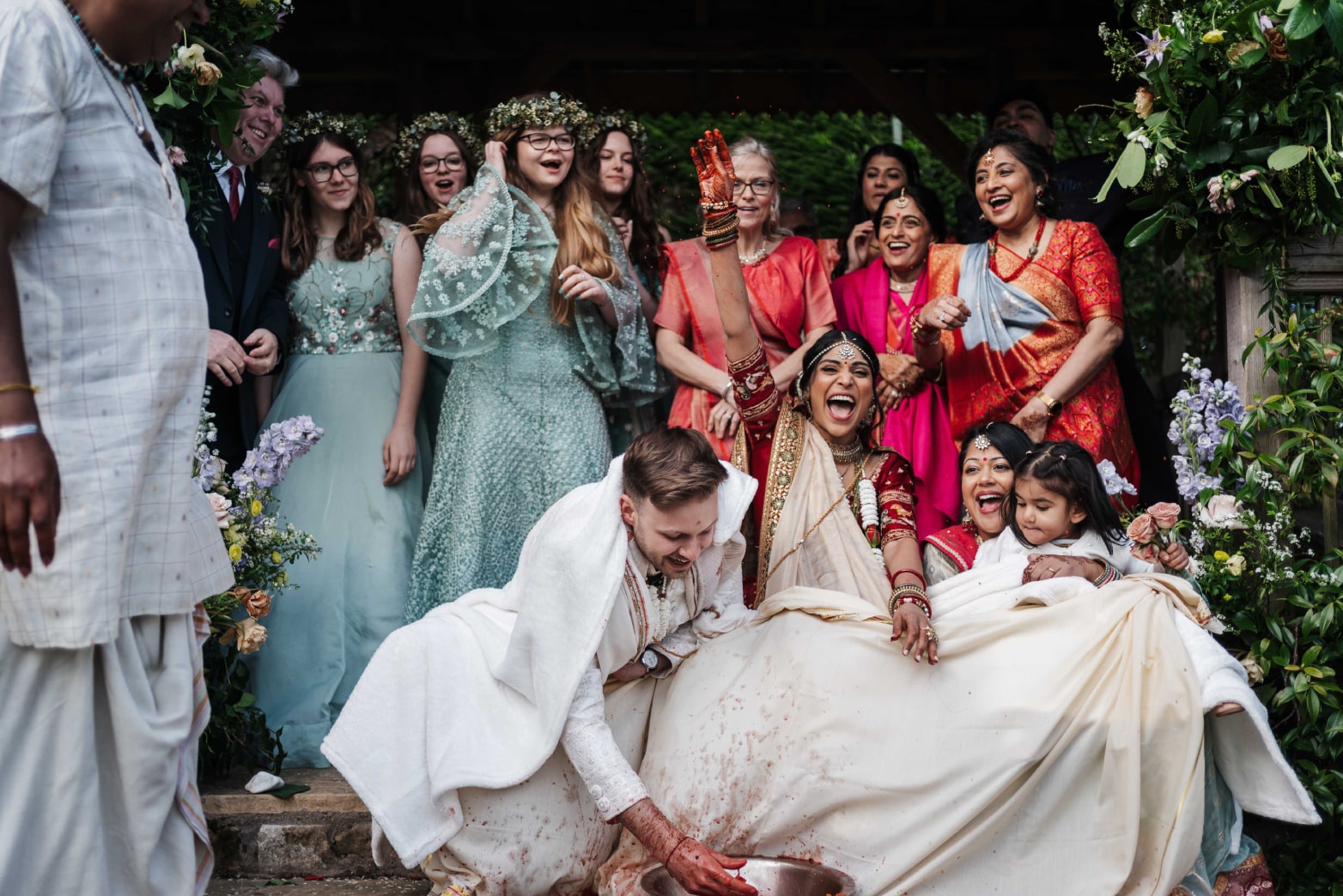 Joyful multi-cultural wedding celebration moment